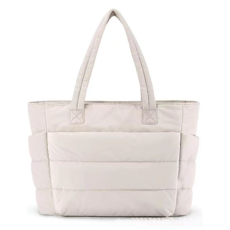 white puffy bag tote​