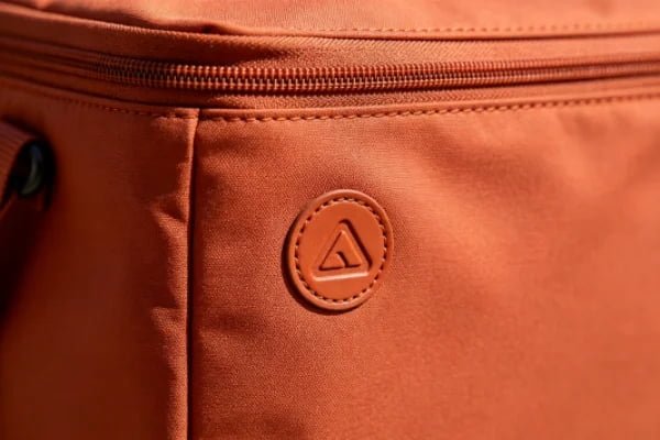 Close-up of custom cooler bag featuring high-density eco-friendly RPET fabric and premium branding