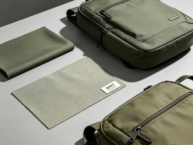 Backpack material comparison: polyester, nylon and RPET recycled fabric swatches with finished custom backpack samples